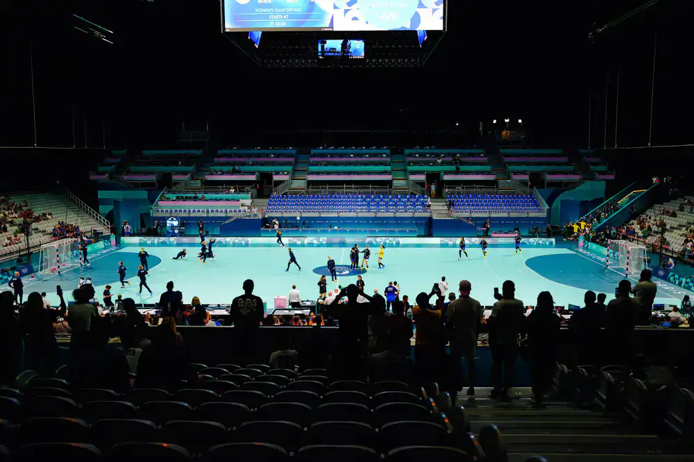 Spectators watching a live esports match in the venue
